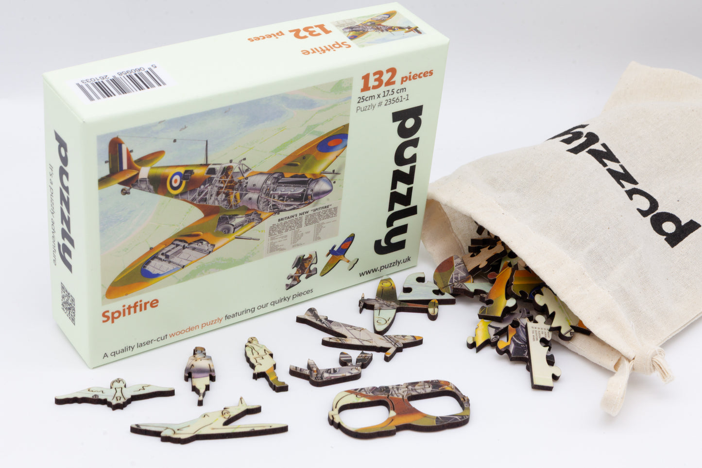 A wooden jigsaw puzzle depicting a 1940's Britain's new 'Spitfire' airplane with an exploded view plan.