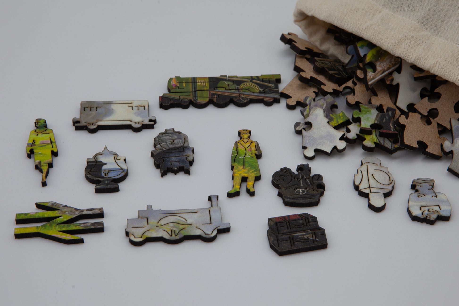 GWR Castle Express Steam Train Wooden Jigsaw Puzzle is a fun 130 piece puzzle.  The perfect gift for train enthusiasts as it contains both regular jigsaw pieces as well as train themed whimsical pieces.  Made in Britain.