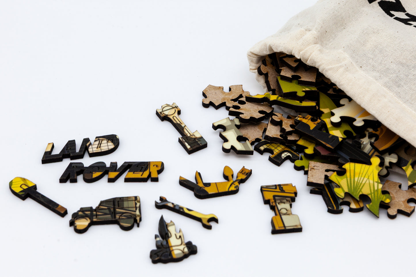 Land Rover Defender Wooden Jigsaw Puzzle - The Camel Trophy Edition. The perfect gift for Land Rover enthusiasts. Comes with 271 or 134 irregular and character pieces. Designed, cut and packaged in Britain.