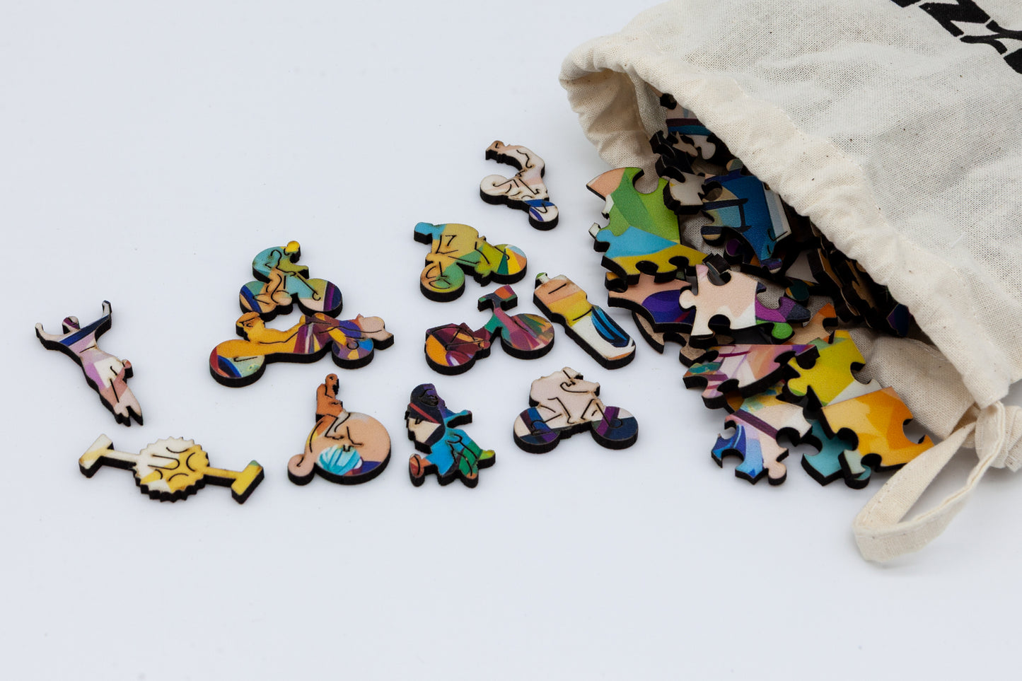Cyclists wooden jigsaw puzzle. Artwork by the Puzzly Company. A fun cycling puzzle with lots of bicycle and racing themed puzzle pieces. 264 or 130 pieces. The perfect puzzle for a cyclist. Made in Britain using sustainable materials.