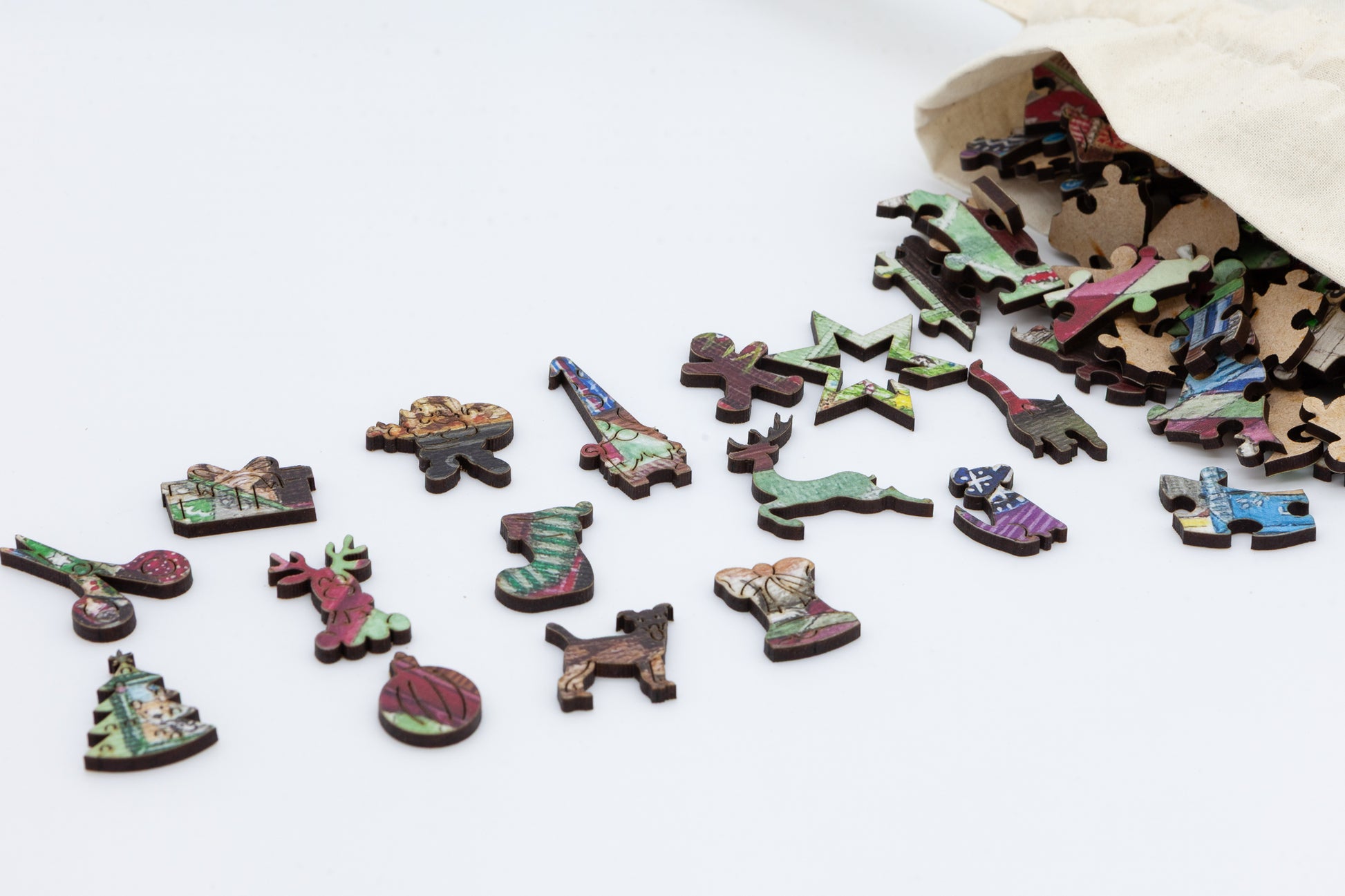 Wrapping the Presents Wooden Jigsaw Puzzle.  Artwork by Lisa Davies.  Full of Christmas themed character pieces.