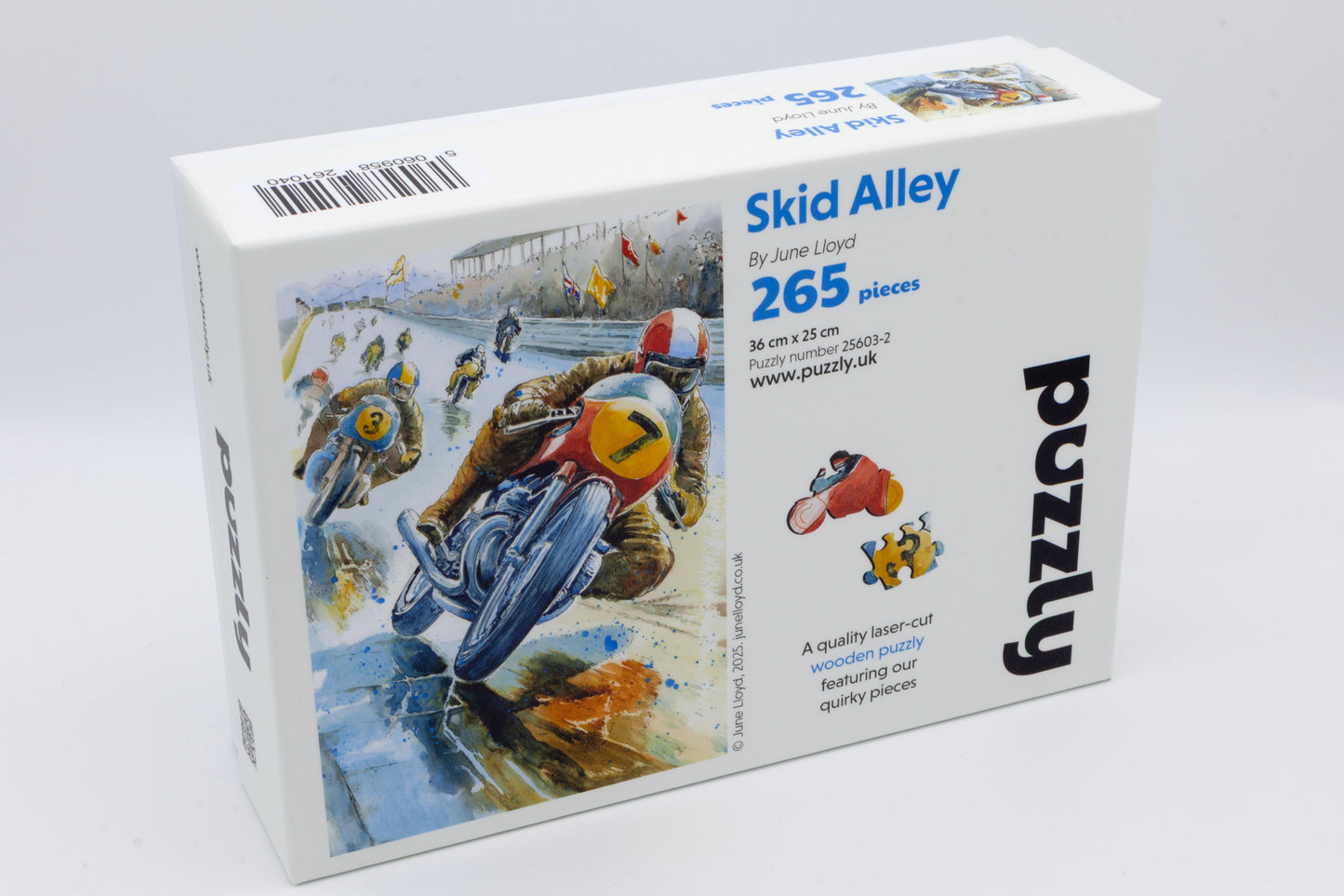 Skid Alley Wooden Jigsaw Puzzle by The Puzzly Company.  Artwork by June Lloyd.  It's a wonderful 1950's inspired Motorcycle Grand Prix race.   The puzzle contains both normal and whimsical jigsaw pieces.  Made in Britain.