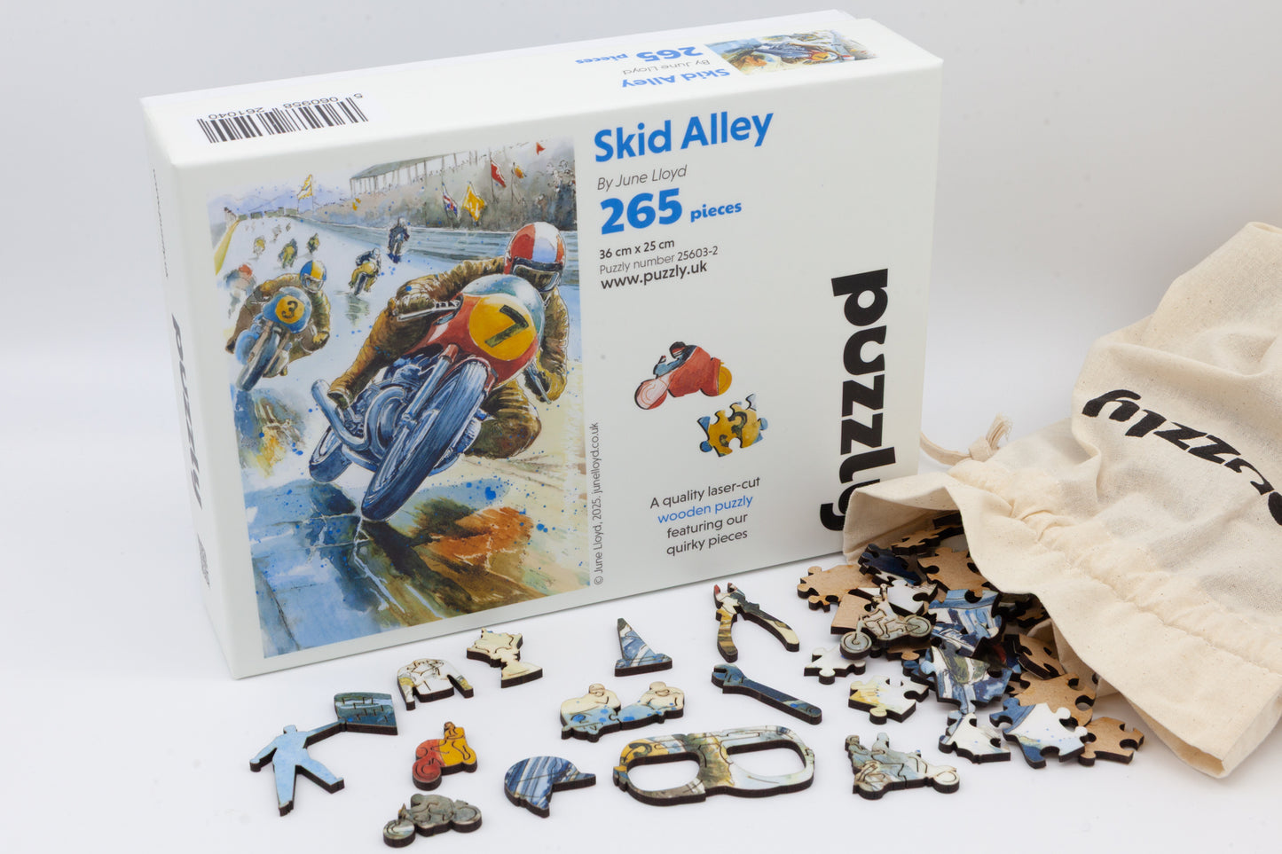 Skid Alley Wooden Jigsaw Puzzle by The Puzzly Company.  Artwork by June Lloyd.  It's a wonderful 1950's inspired Motorcycle Grand Prix race.   The puzzle contains both normal and whimsical jigsaw pieces.  Made in Britain.