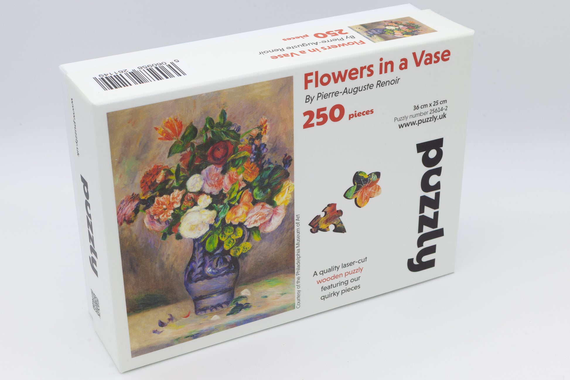 Flowers in a Vase Wooden Jigsaw Puzzle painted by Pierre-Auguste Renoir.  It is a wonderful  fine art puzzle that comes with traditional and whimsical jigsaw pieces. Made in Britain.