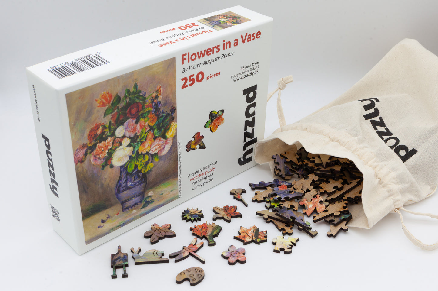 Flowers in a Vase Wooden Jigsaw Puzzle painted by Pierre-Auguste Renoir.  It is a wonderful  fine art puzzle that comes with traditional and whimsical jigsaw pieces. Made in Britain.