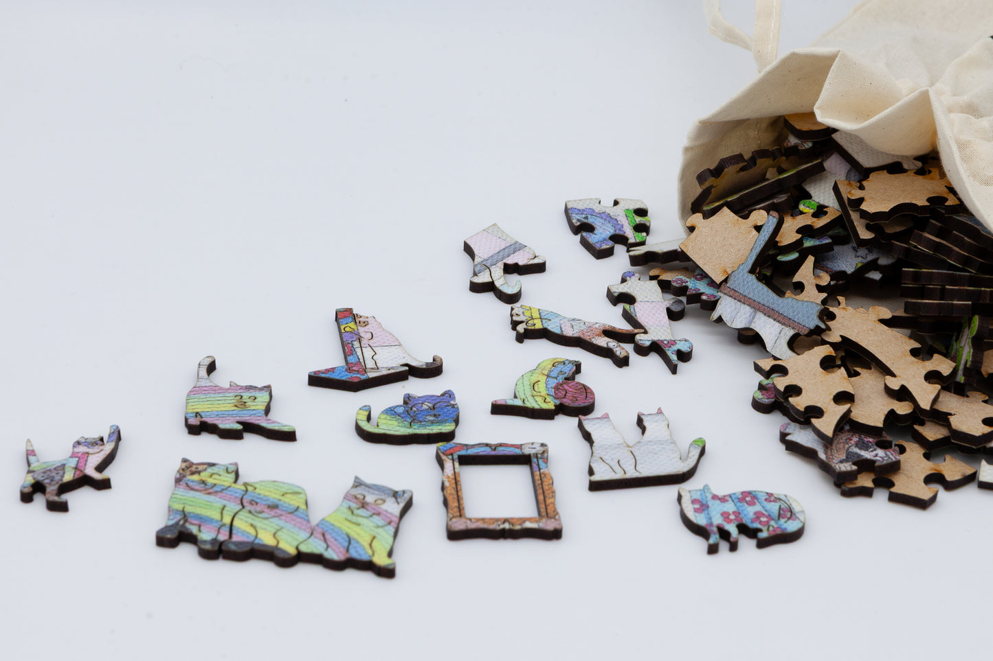 The Mad Cat Lady Wooden Jigsaw Puzzle is a fun painting by Lisa Davies that is full of cats.  The puzzle has 200 pieces including lots of cat themed puzzle pieces.