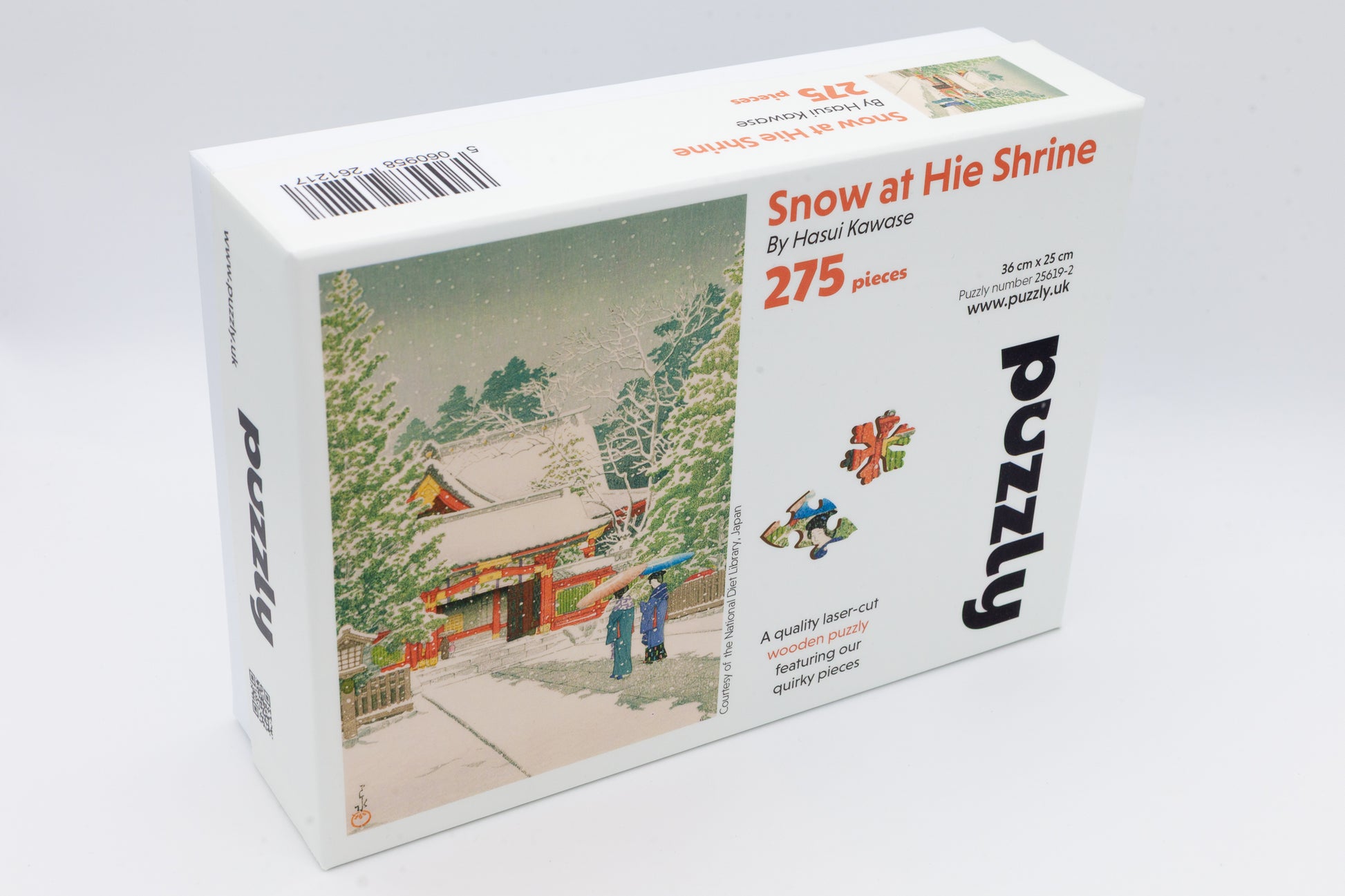 Snow at Hie Shrine wooden jigsaw puzzle.  Contains 275 jigsaw pieces.  Artwork by Hasui Kawase.  With irregular shaped and themed whimsical pieces. 