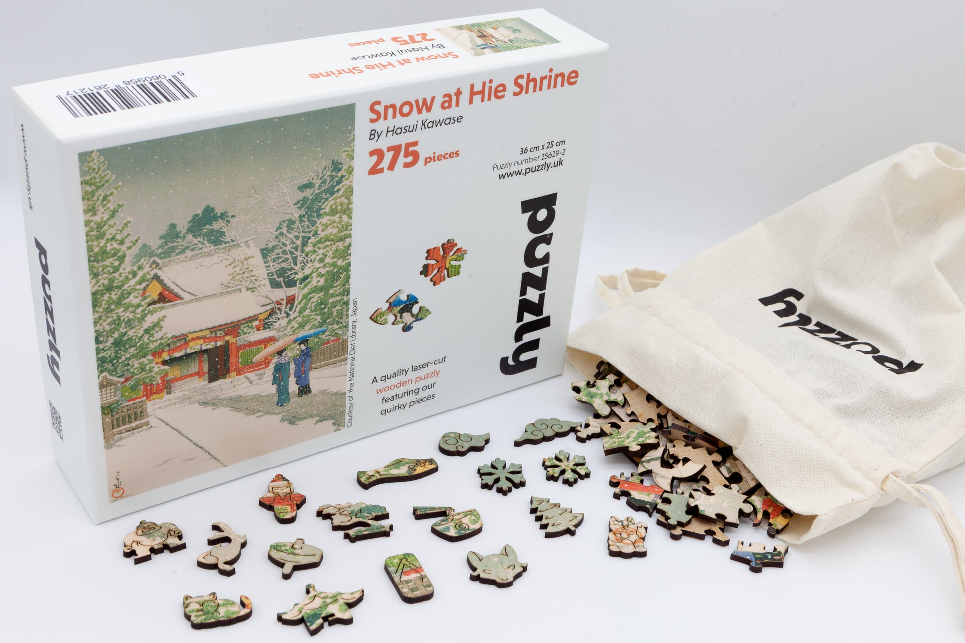 Snow at Hie Shrine wooden jigsaw puzzle.  Contains 275 jigsaw pieces.  Artwork by Hasui Kawase.  With irregular shaped and themed whimsical pieces. 