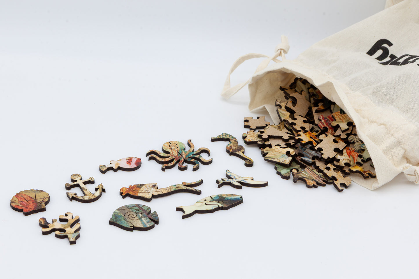 Ocean Life wooden jigsaw puzzle.  3 sizes available.  Full of sea creature themed jigsaw pieces.  Crafted in Britain by the Puzzly Company.