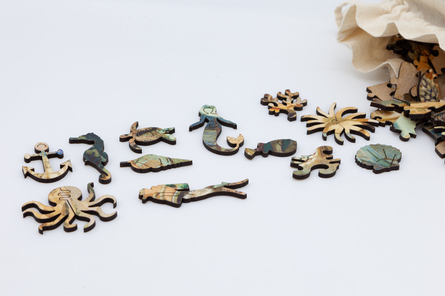 Ocean Life wooden jigsaw puzzle.  3 sizes available.  Full of sea creature themed jigsaw pieces.  Crafted in Britain by the Puzzly Company.