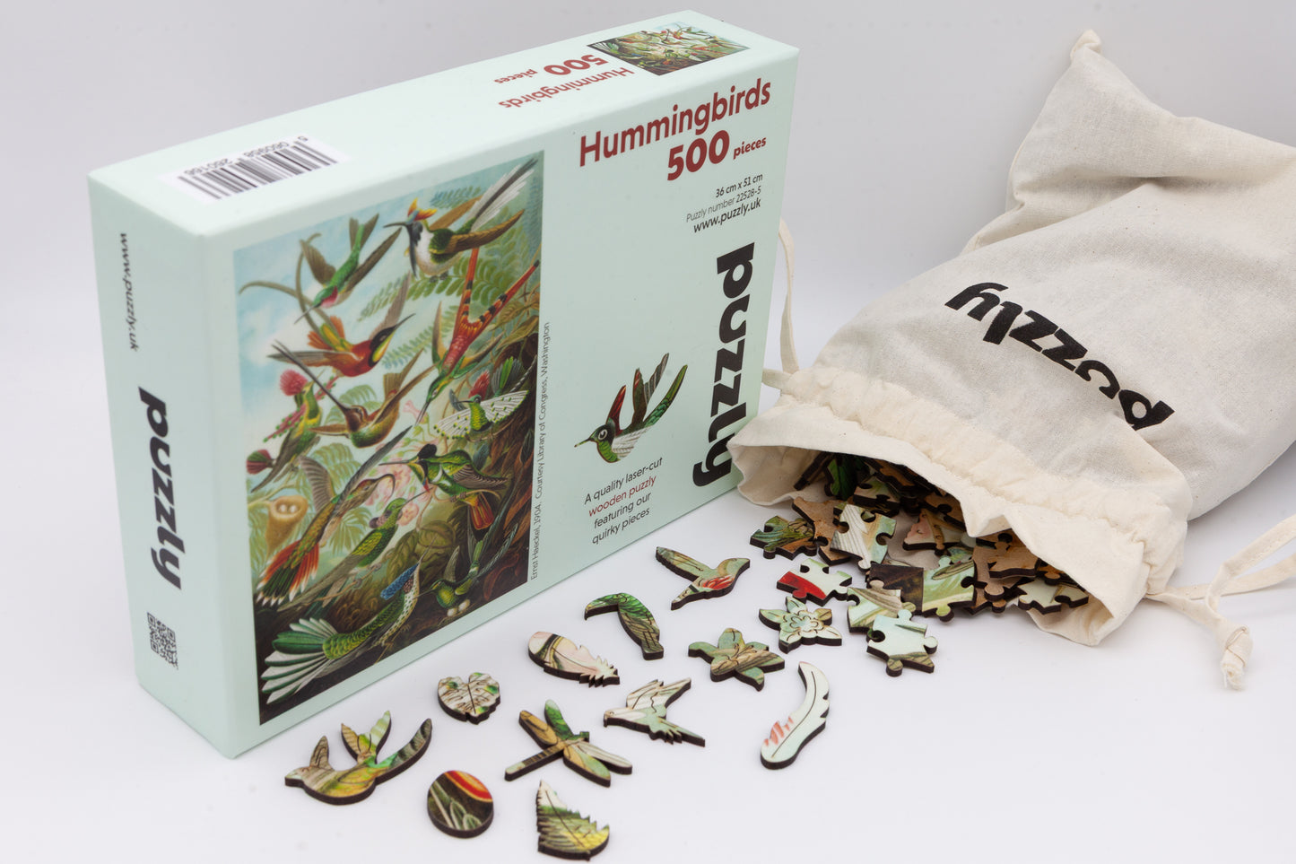 Hummingbirds wooden jigsaw puzzle.  3 sizes to chose from.  Whimsical and irregular shaped pieces.  Made in Britain by The Puzzly Company.