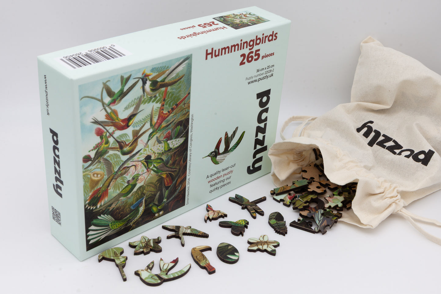 Hummingbirds wooden jigsaw puzzle.  3 sizes to chose from.  Whimsical and irregular shaped pieces.  Made in Britain by The Puzzly Company.