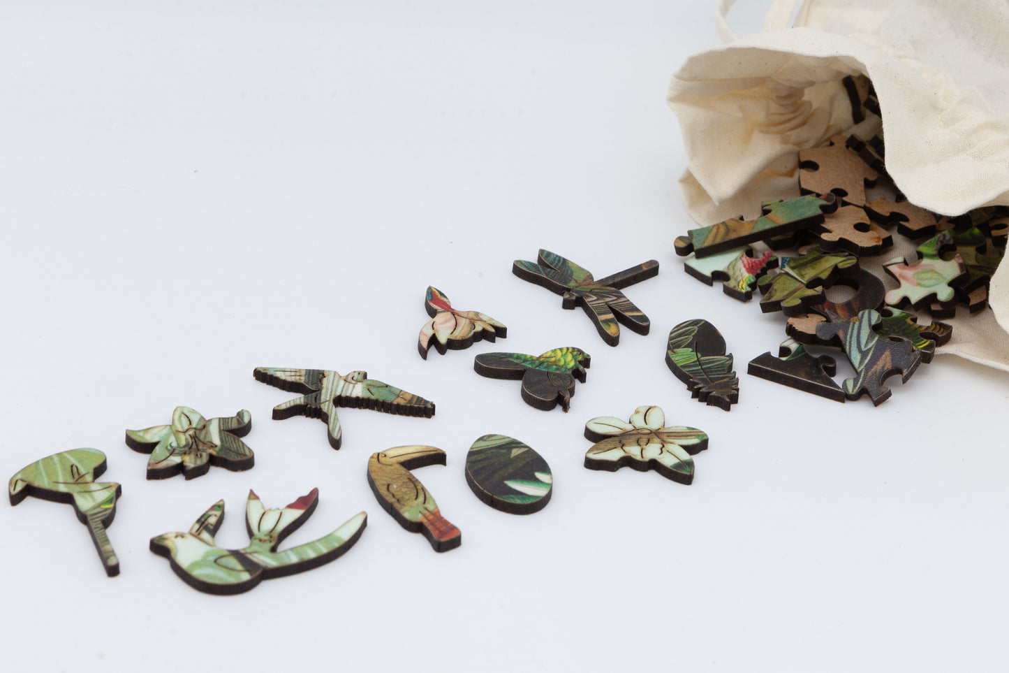 Hummingbirds wooden jigsaw puzzle.  3 sizes to chose from.  Whimsical and irregular shaped pieces.  Made in Britain by The Puzzly Company.