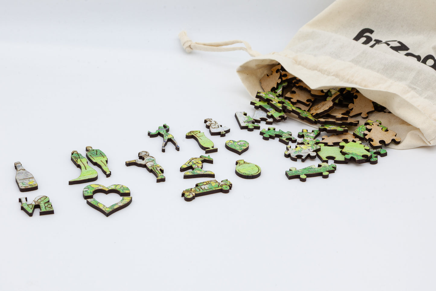 Mr and Mrs Wooden Jigsaw puzzle.  A great gift for the bride and groom.  A puzzle full of wedding themed jigsaw pieces.  Made in Britain by The Puzzly Company.