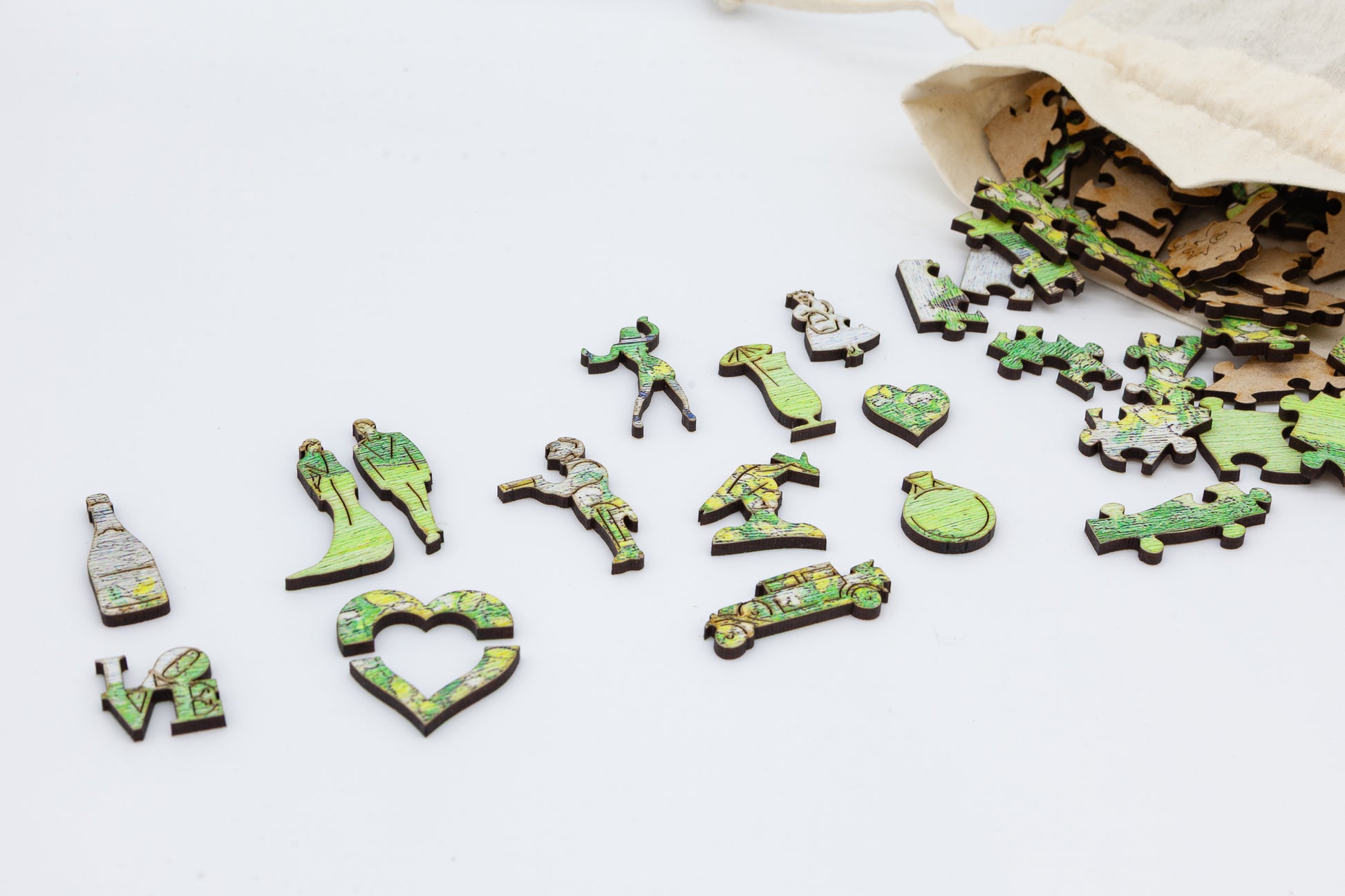 Mr and Mrs Wooden Jigsaw puzzle.  A great gift for the bride and groom.  A puzzle full of wedding themed jigsaw pieces.  Made in Britain by The Puzzly Company.