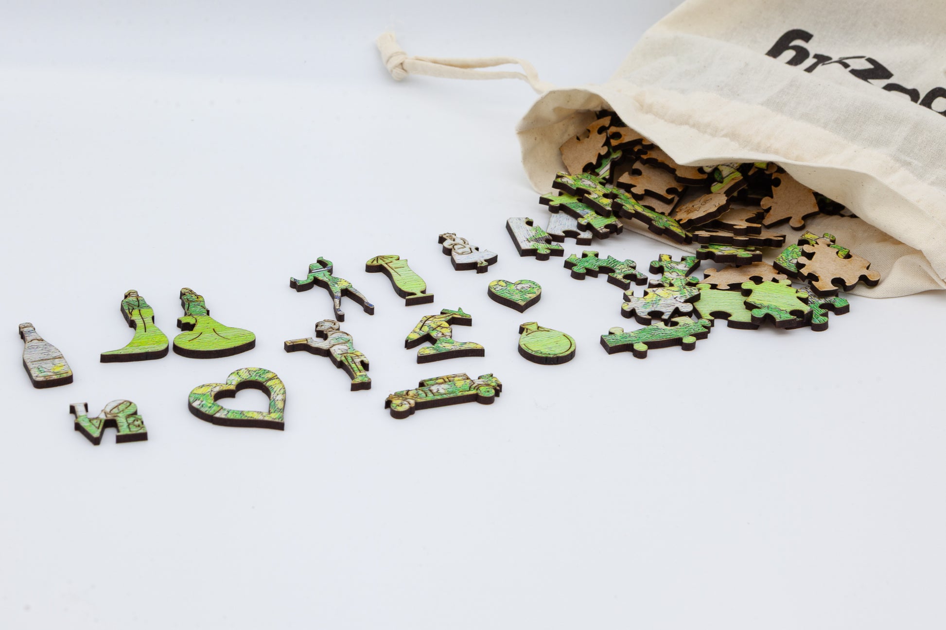 Mrs and Mrs Wooden Jigsaw puzzle.  A great gift for the bride and bride.  A puzzle full of gay wedding themed jigsaw pieces.  Made in Britain by The Puzzly Company.