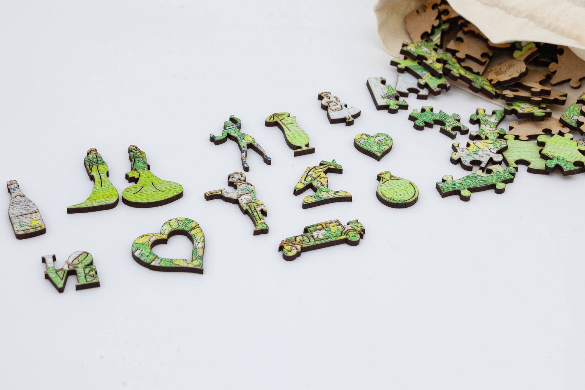 Mrs and Mrs Wooden Jigsaw puzzle.  A great gift for the bride and bride.  A puzzle full of gay wedding themed jigsaw pieces.  Made in Britain by The Puzzly Company.