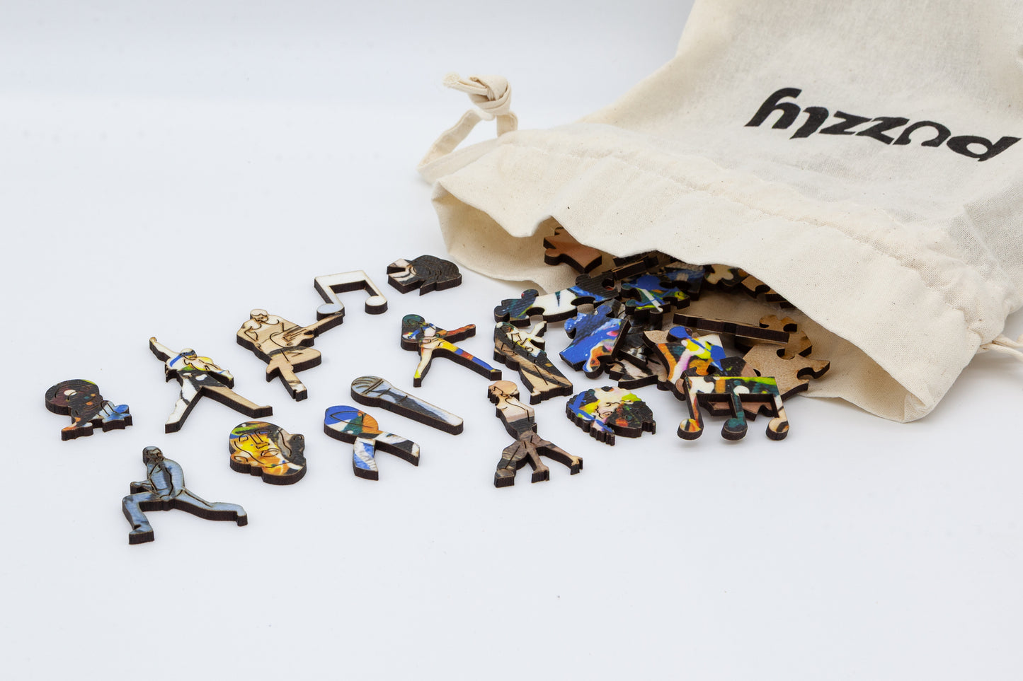 Freddie Mercury Wooden Jigsaw Puzzle.  Contains wonderful Freddie and Queen related character pieces.  Made in Britain by The Puzzly Company