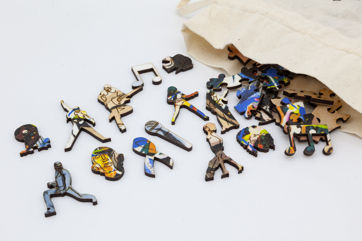 Freddie Mercury Wooden Jigsaw Puzzle.  Contains wonderful Freddie and Queen related character pieces.  Made in Britain by The Puzzly Company