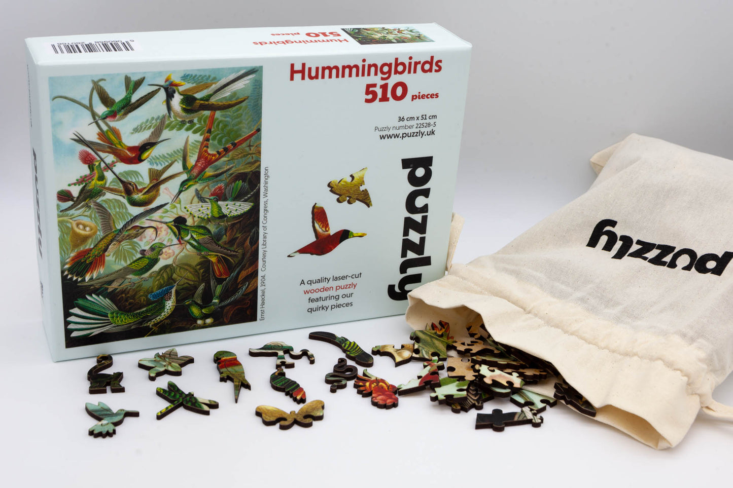 Hummingbirds wooden jigsaw puzzle.  3 sizes to chose from.  Whimsical and irregular shaped pieces.  Made in Britain by The Puzzly Company.