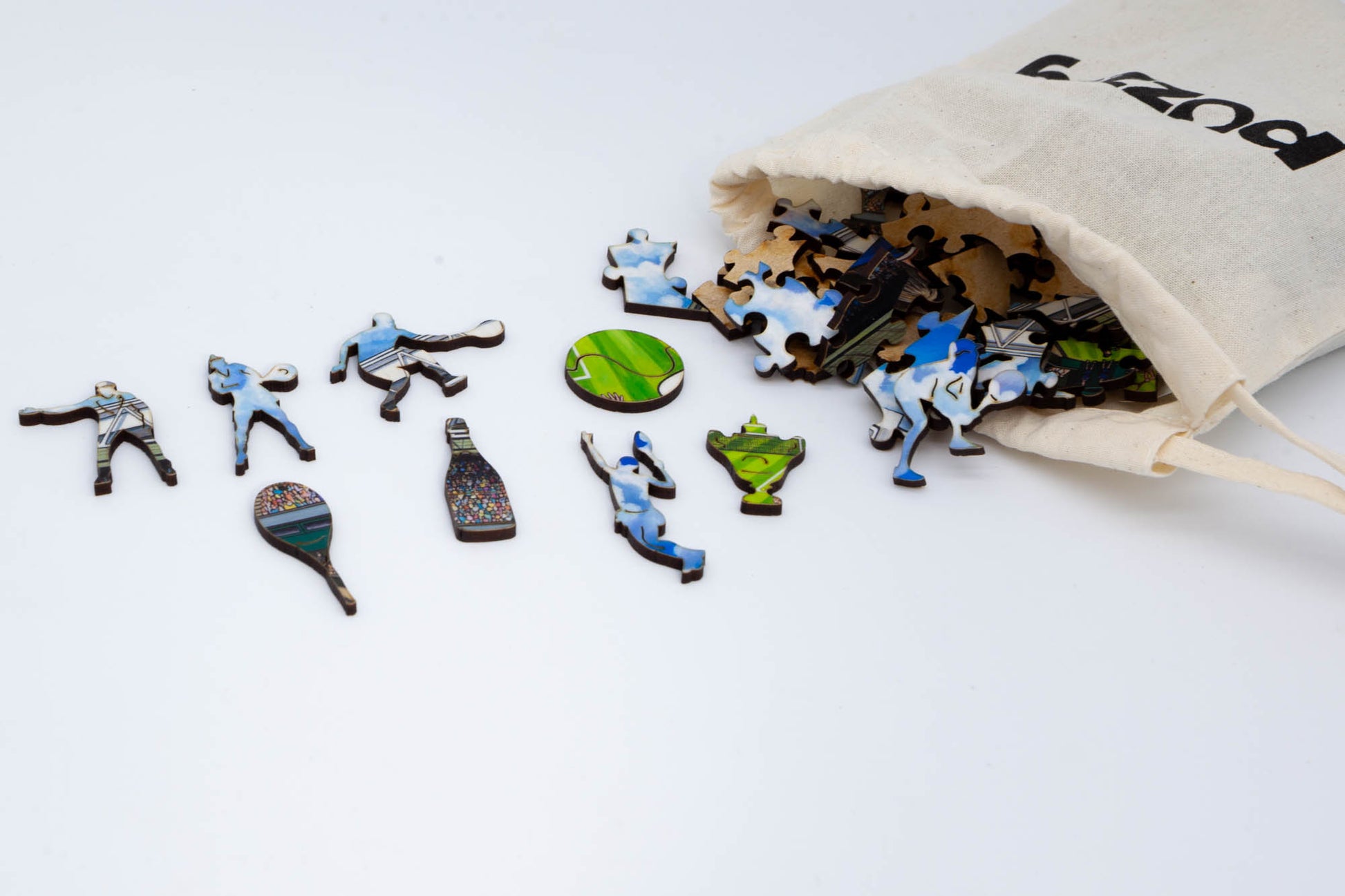 The Tennis Match wooden jigsaw puzzle.  A great tennis themed puzzle containing both irregular and whimsical pieces.  Available in 2 sizes: 250 or 130 pieces.  Designed and cut by the Puzzly Company.
