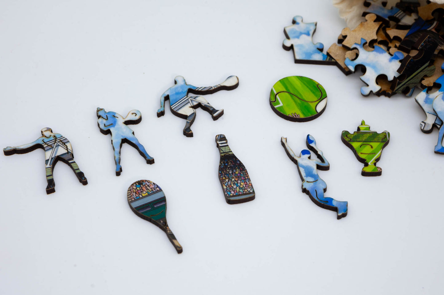 The Tennis Match wooden jigsaw puzzle.  A great tennis themed puzzle containing both irregular and whimsical pieces.  Available in 2 sizes: 250 or 130 pieces.  Designed and cut by the Puzzly Company.