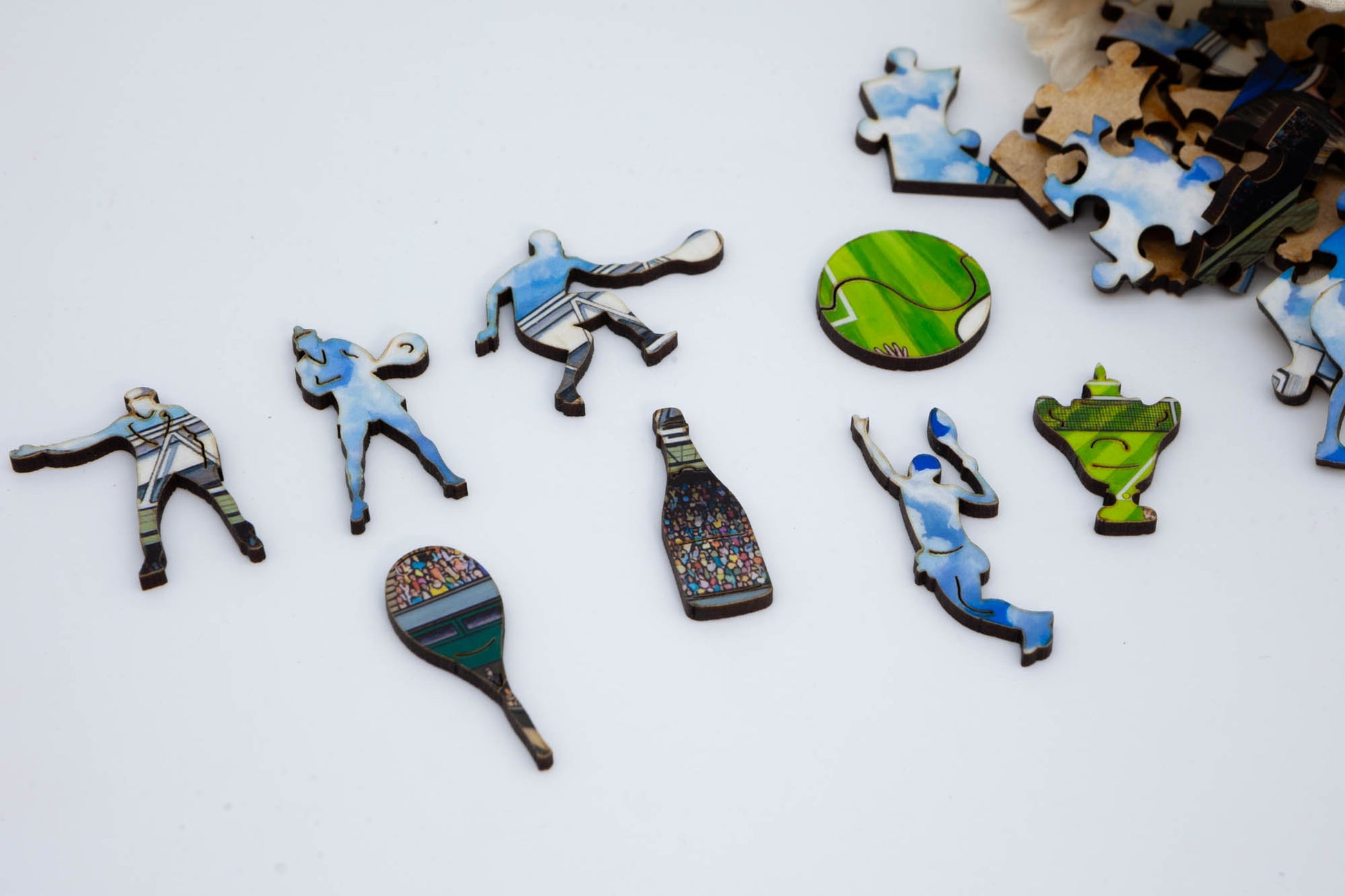 The Tennis Match wooden jigsaw puzzle.  A great tennis themed puzzle containing both irregular and whimsical pieces.  Available in 2 sizes: 250 or 130 pieces.  Designed and cut by the Puzzly Company.