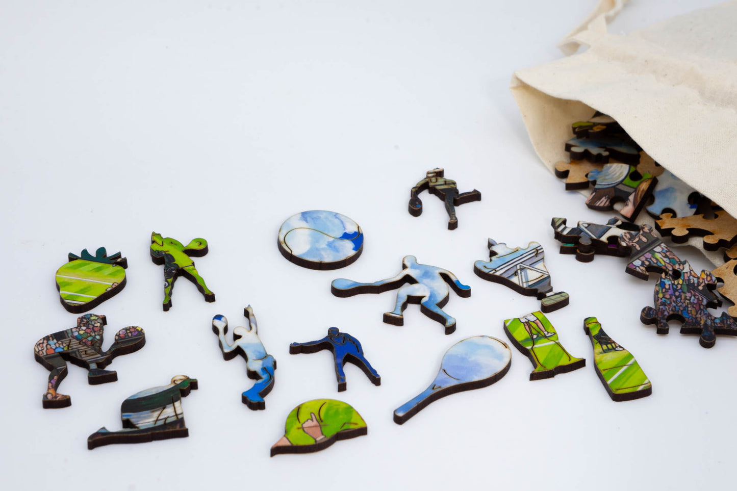 The Tennis Match wooden jigsaw puzzle.  A great tennis themed puzzle containing both irregular and whimsical pieces.  Available in 2 sizes: 250 or 130 pieces.  Designed and cut by the Puzzly Company.