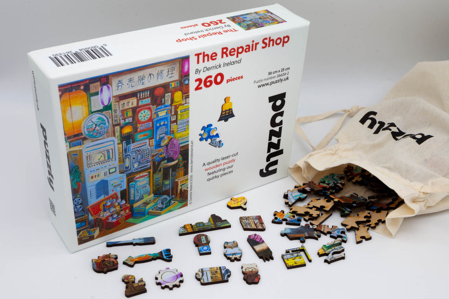 The Repair Shop wooden Jigsaw Puzzle.  Artwork by Derrick Ireland.  A mythical Japanese scene of a repair shop run by a chameleon.  Contains irregular and whimsical jigsaw pieces.  Made in Britian. 