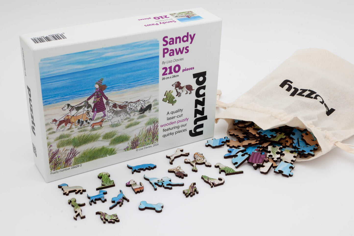 Sandy Paws Wooden Jigsaw Puzzle.  Original artwork by Lisa Davies.  210 dog themed and irregular jigsaw pieces.  Made in Britain by The Puzzly Company.
