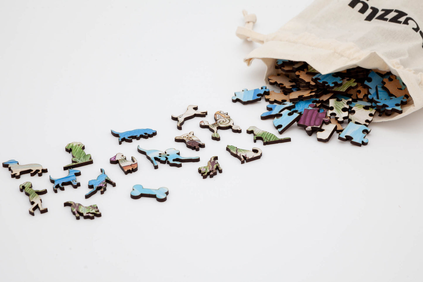 Sandy Paws Wooden Jigsaw Puzzle.  Original artwork by Lisa Davies.  210 dog themed and irregular jigsaw pieces.  Made in Britain by The Puzzly Company.