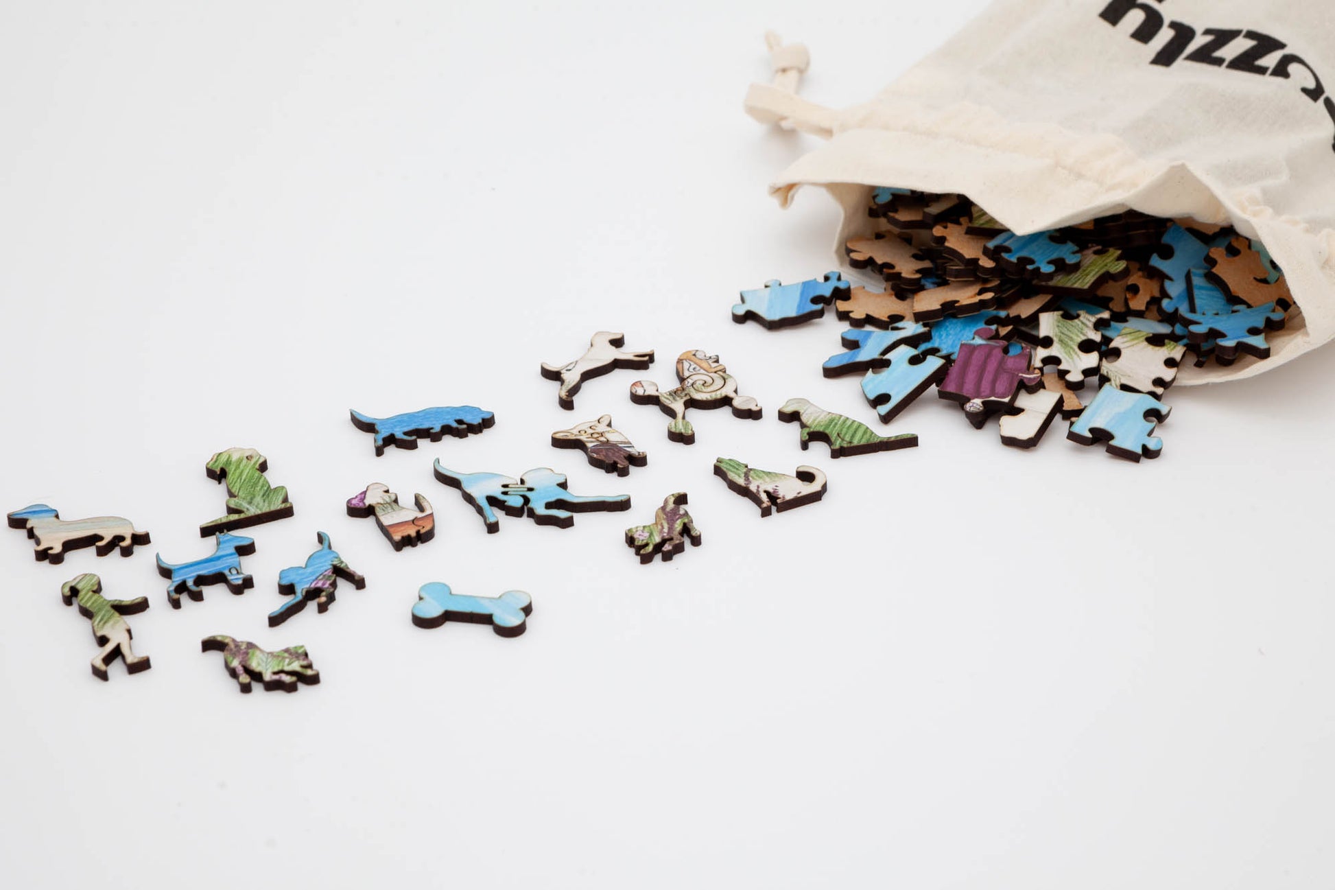 Sandy Paws Wooden Jigsaw Puzzle.  Original artwork by Lisa Davies.  210 dog themed and irregular jigsaw pieces.  Made in Britain by The Puzzly Company.