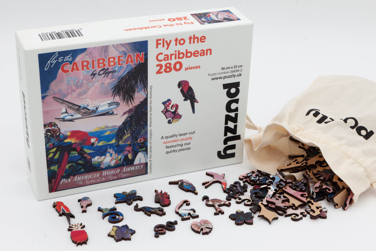 Fly to the Caribbean wooden jigsaw puzzle.  A fun puzzle of a vintage travel poster.  280 pieces including irregular and whimsical pieces.  Made in Britain by The Puzzly Company