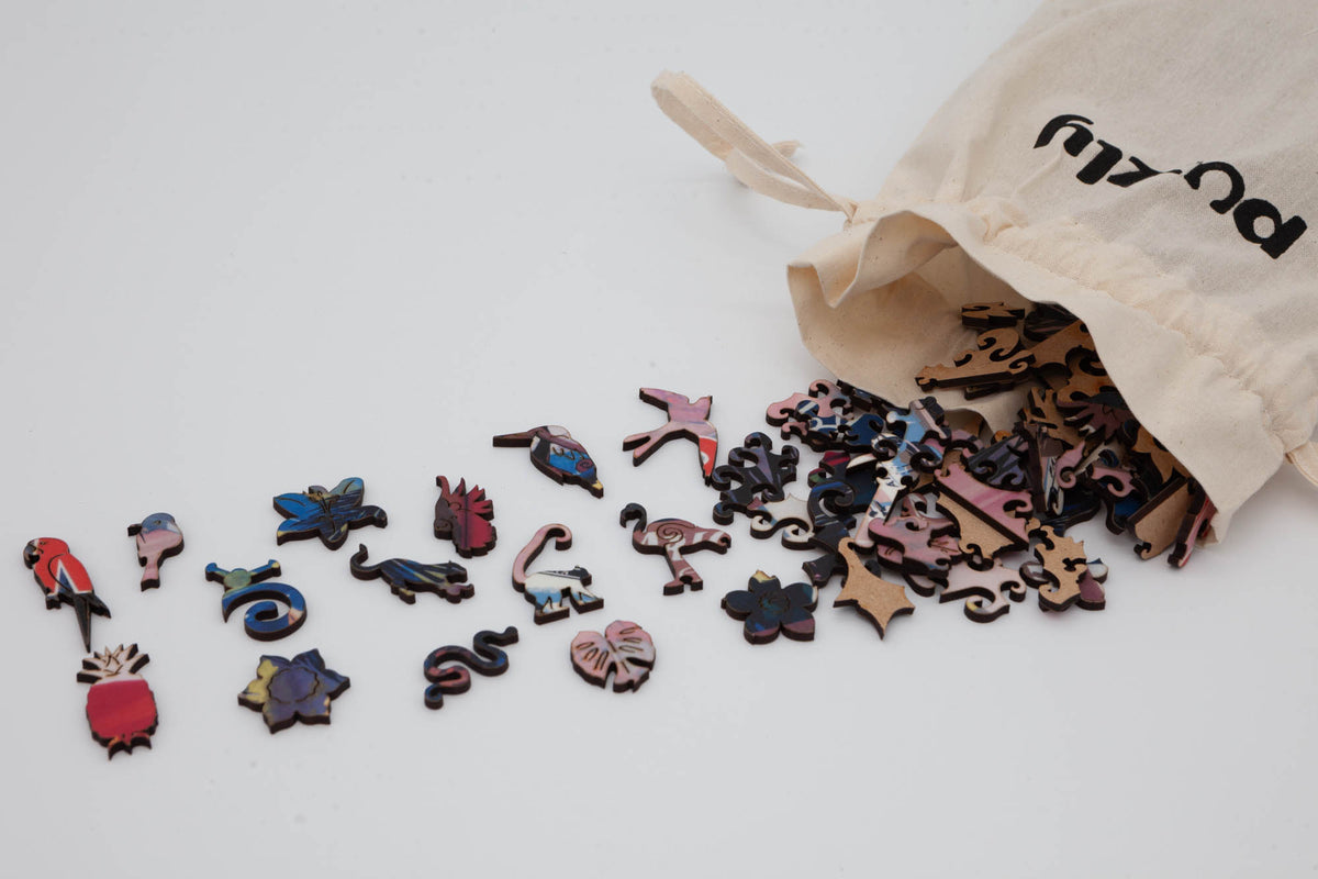 Fly to the Caribbean wooden jigsaw puzzle.  A fun puzzle of a vintage travel poster.  280 pieces including irregular and whimsical pieces.  Made in Britain by The Puzzly Company
