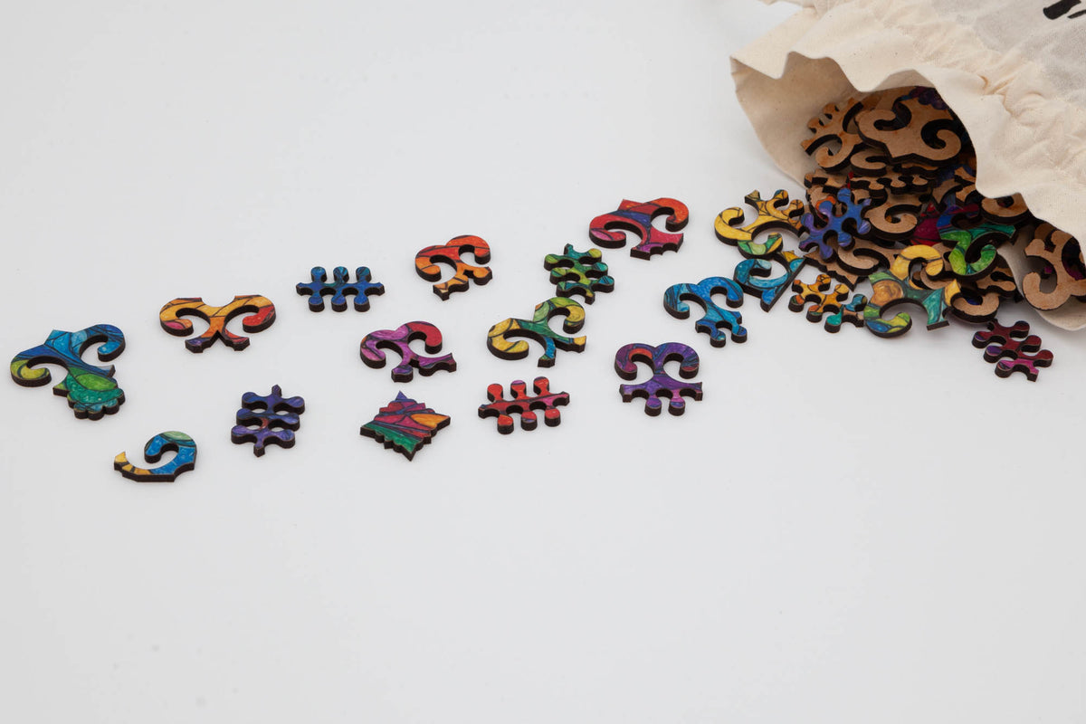 Stained Glass Wooden Jigsaw Puzzle with a tessellation cut that is fun to complete.  Made in Britain by The Puzzly Company 